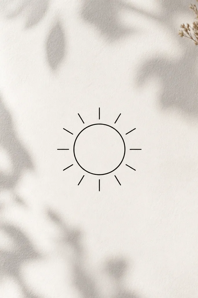 A small sun drawn in one continuous black line: a circle with short evenly spaced rays around it. The sun is centered and about 2.5 inches across.